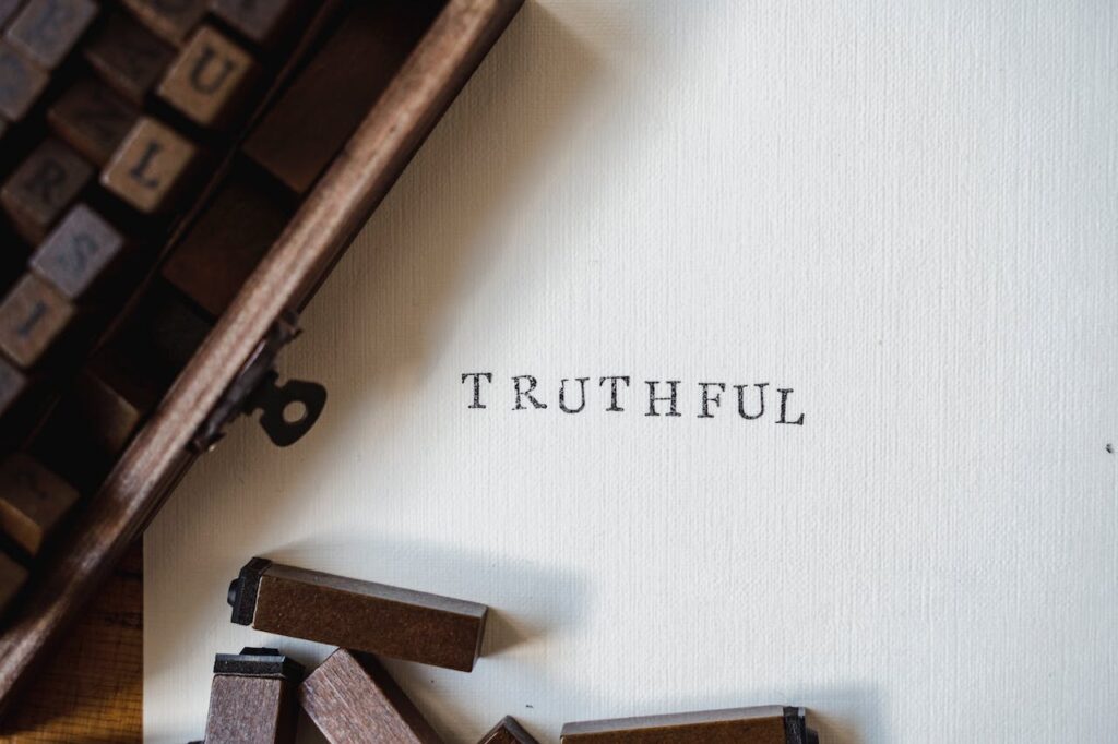 The word TRUTHFUL printed with ink blocks on a piece of white paper